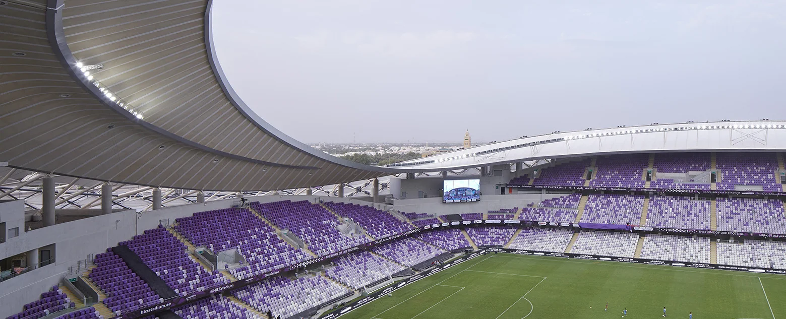 Interior of Hazza Bin Zayed Stadium showing the stands and pitch